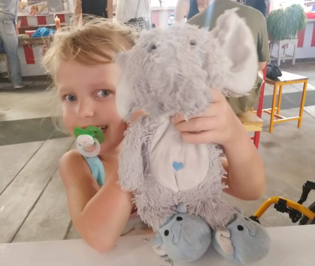 Lotta with her plush elephant